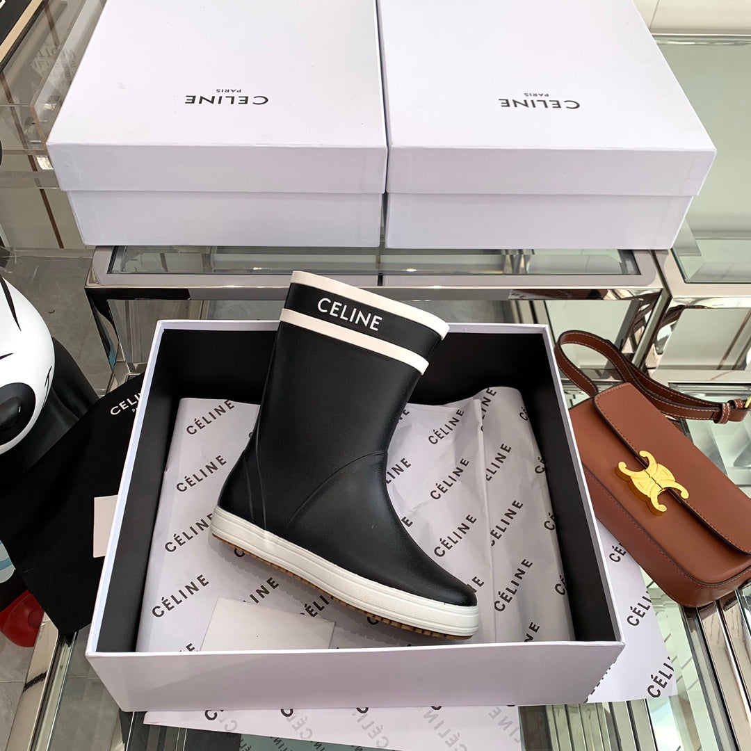 RAIN BOOTS IN BLACK MIX WHITE RUBBER