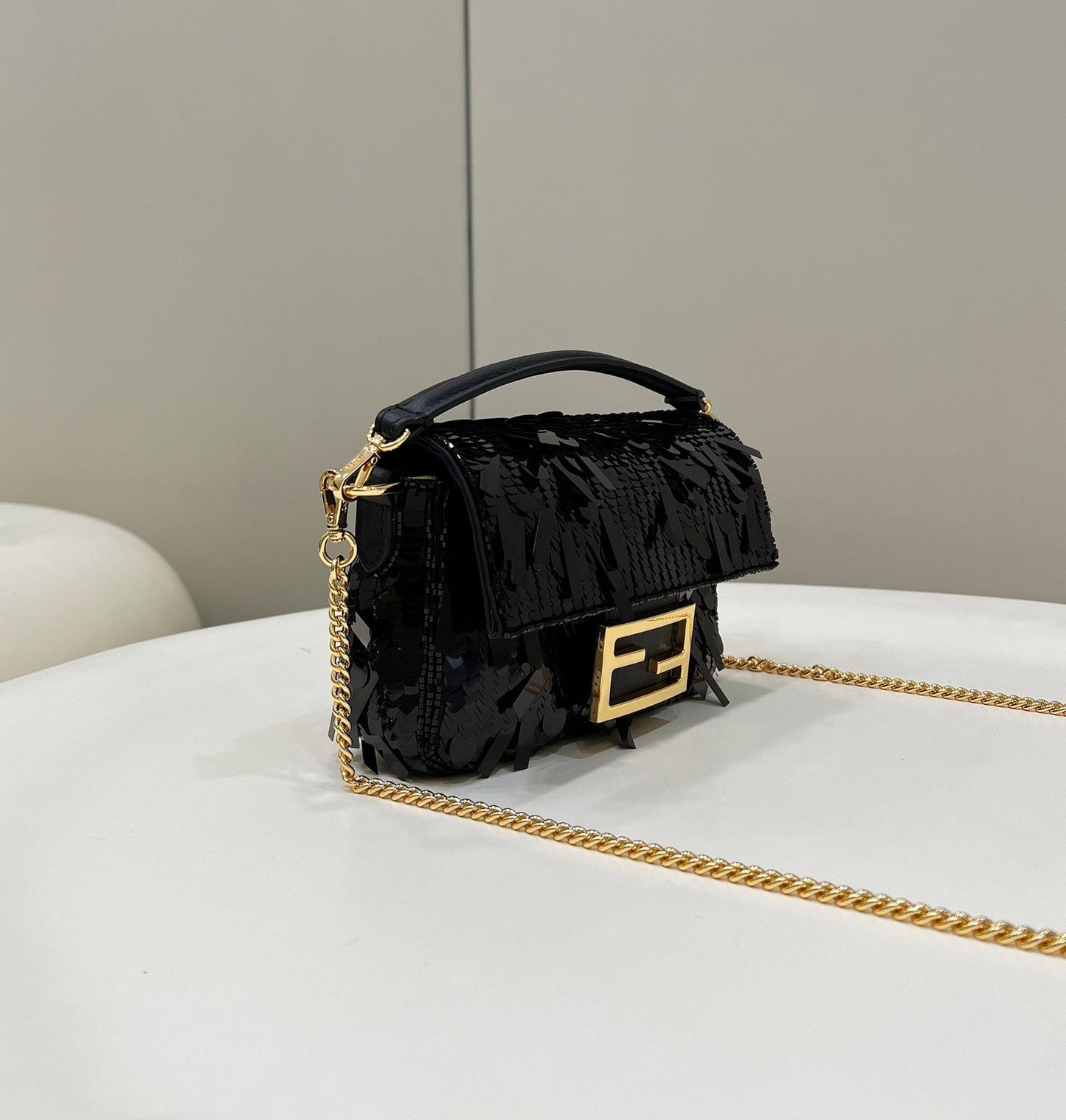 BAGUETTE MINI 19 IN BLACK SEQUINS GOLD HARDWARE