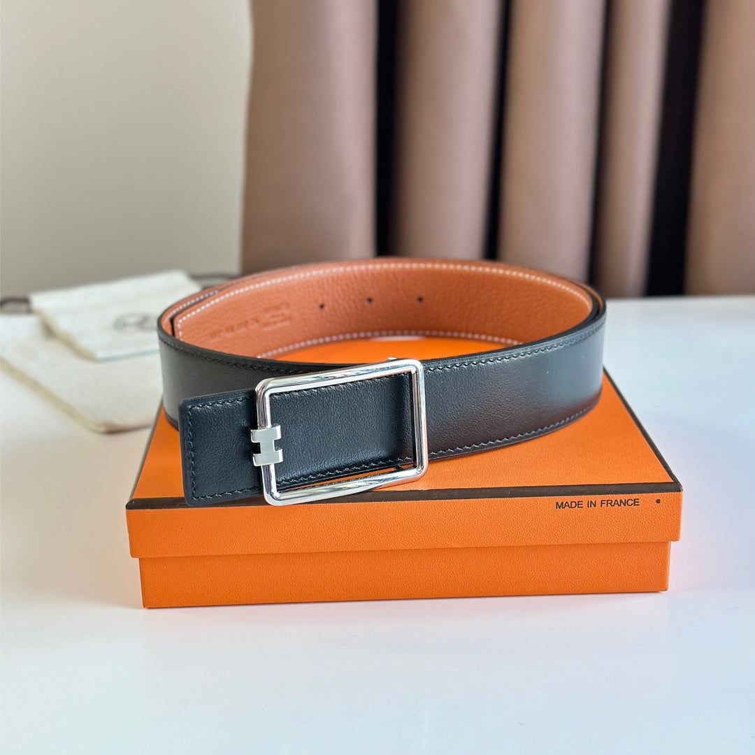 HM TUBE H BELT BUCKLE & REVERSIBLE BLACK AND YAM ORANGE LEATHER STRAP 38MM SILVER HARDWARE