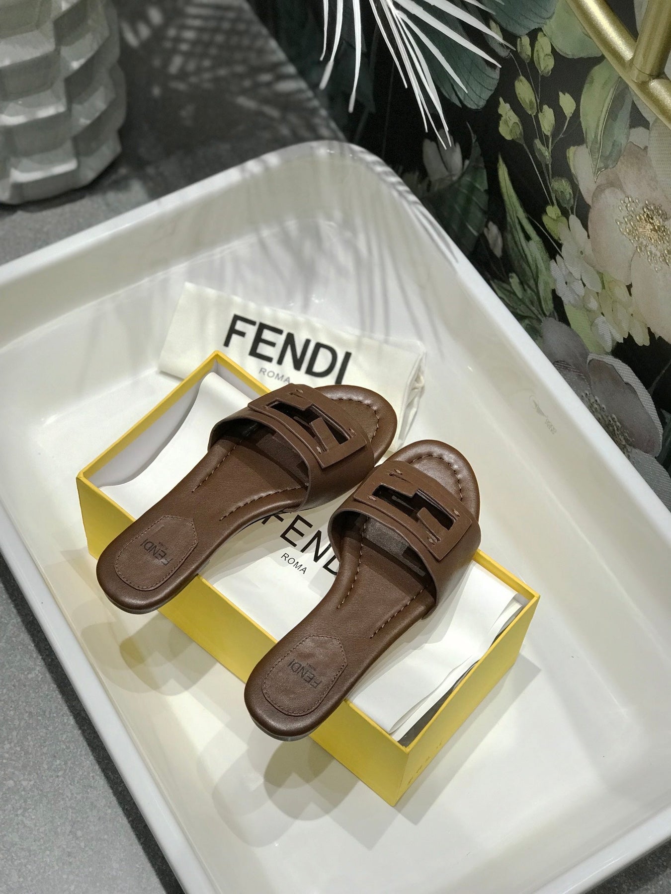 FENDI BAGUETTE SLIDES IN COFFEE BROWN LAMBSKIN