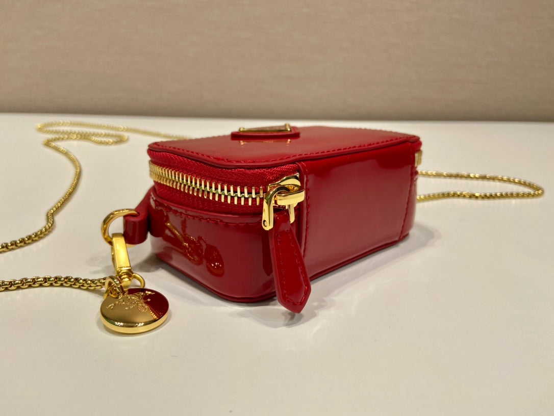 MINI HAND BAG 11 WITH GOLD STRAP IN RED PATENT CALFSKIN