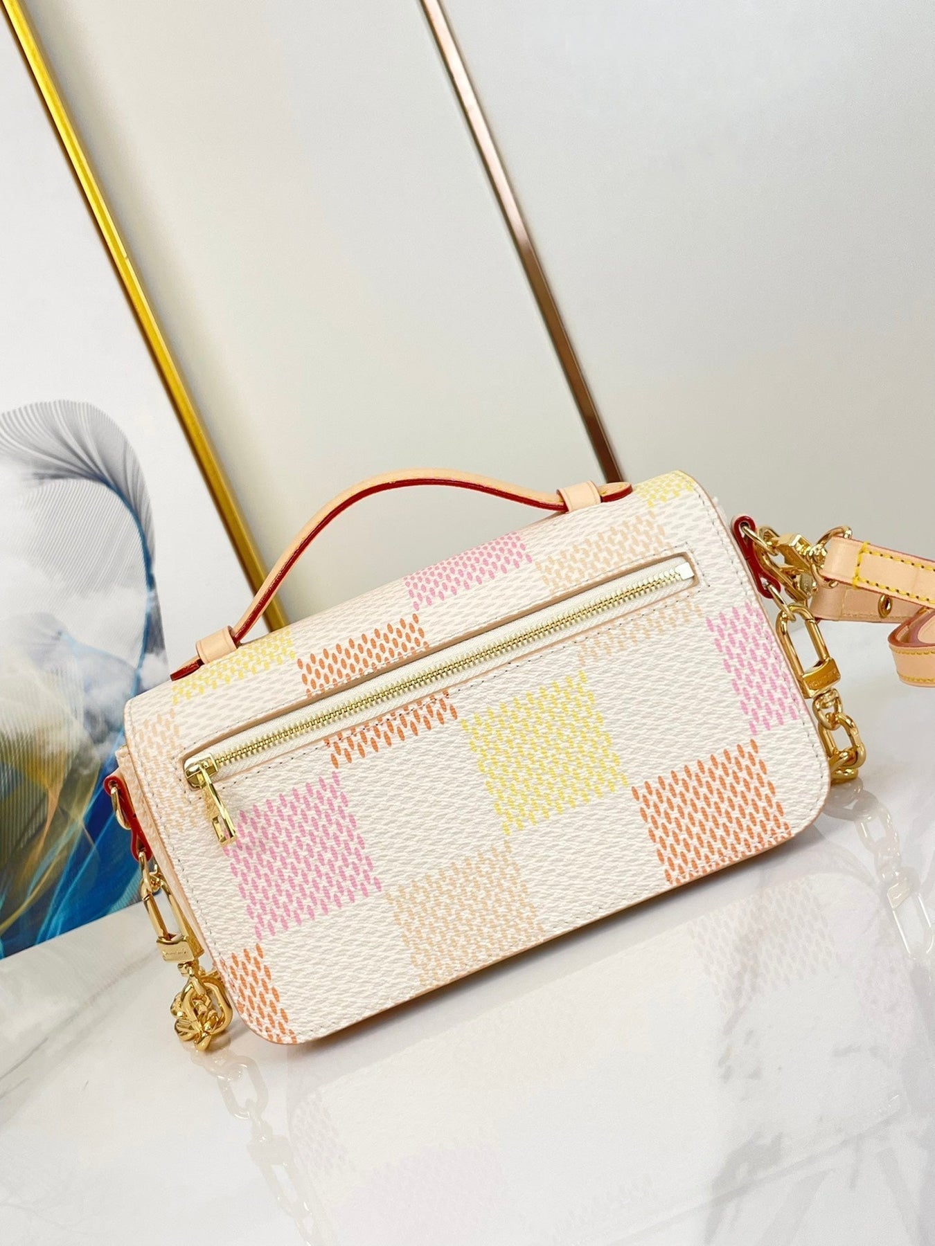 POCHETTE MÉTIS EAST WEST 21 IN PEACH DAMIER GIANT CANVAS GOLD HARDWARE