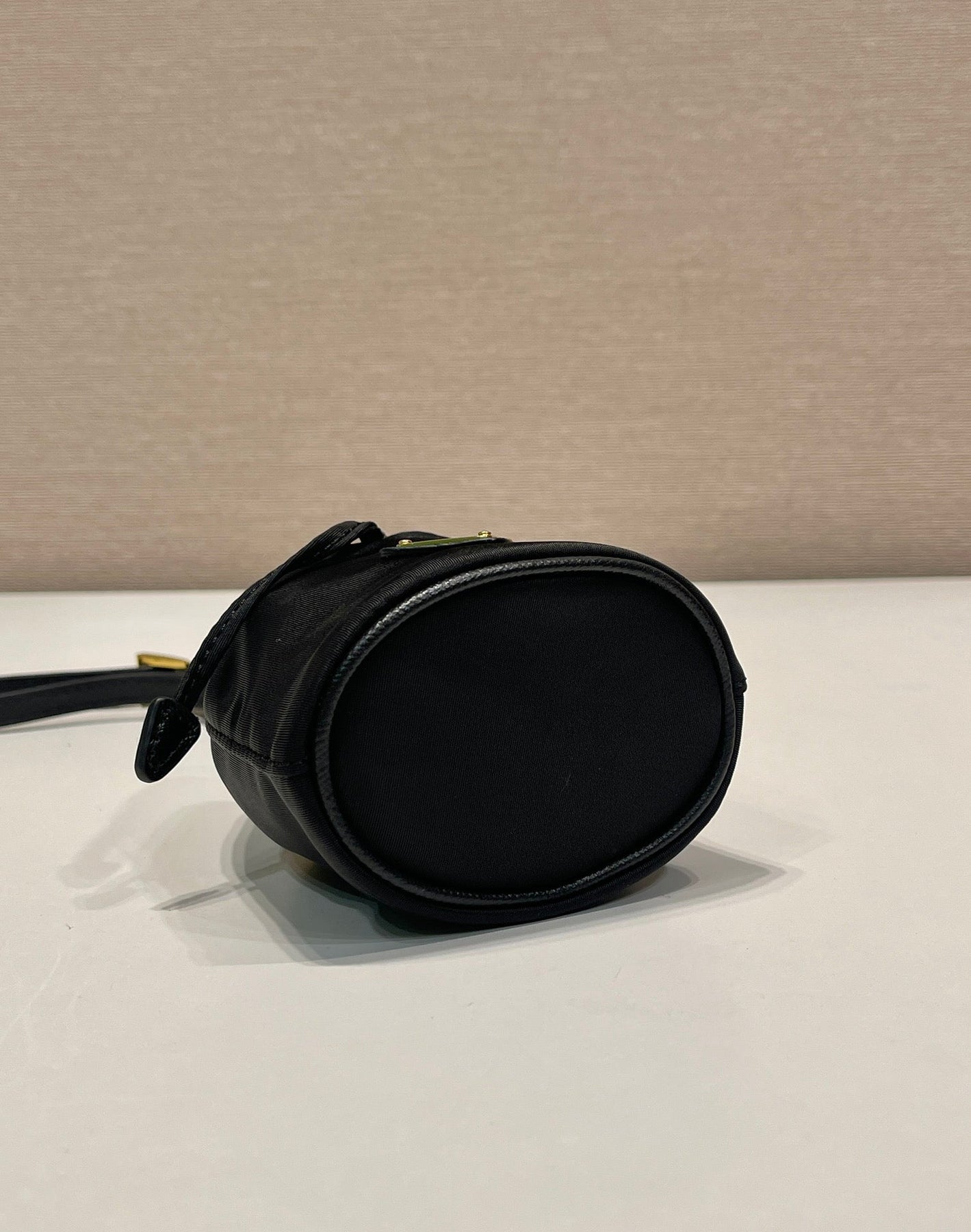 MINI BUCKET BAG 10 IN BLACK RE-NYLON AND SAFFIANO LEATHER STRAP