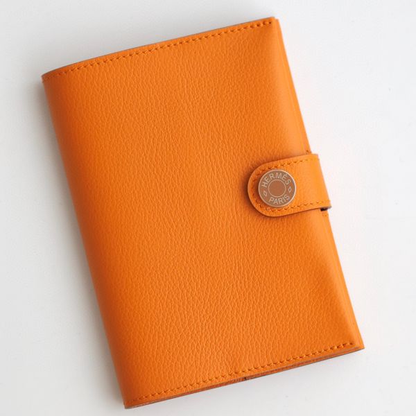 HERM R.M.S Passport Holder in Apricot Evercolor Calfskin