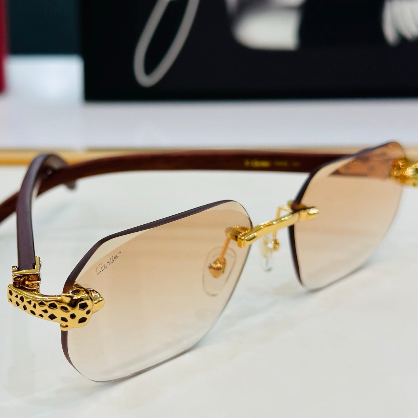 PANTHÈRE RIMLESS OVAL FRAME SUNGLASSES 543637 IN METAL