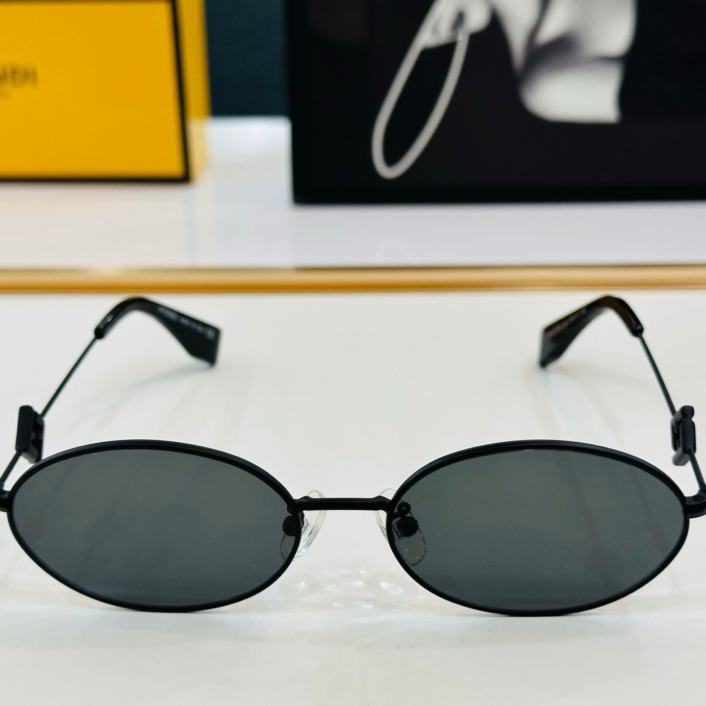 FIRST CRYSTAL OVAL FRAME SUNGLASSES E40151 IN METAL