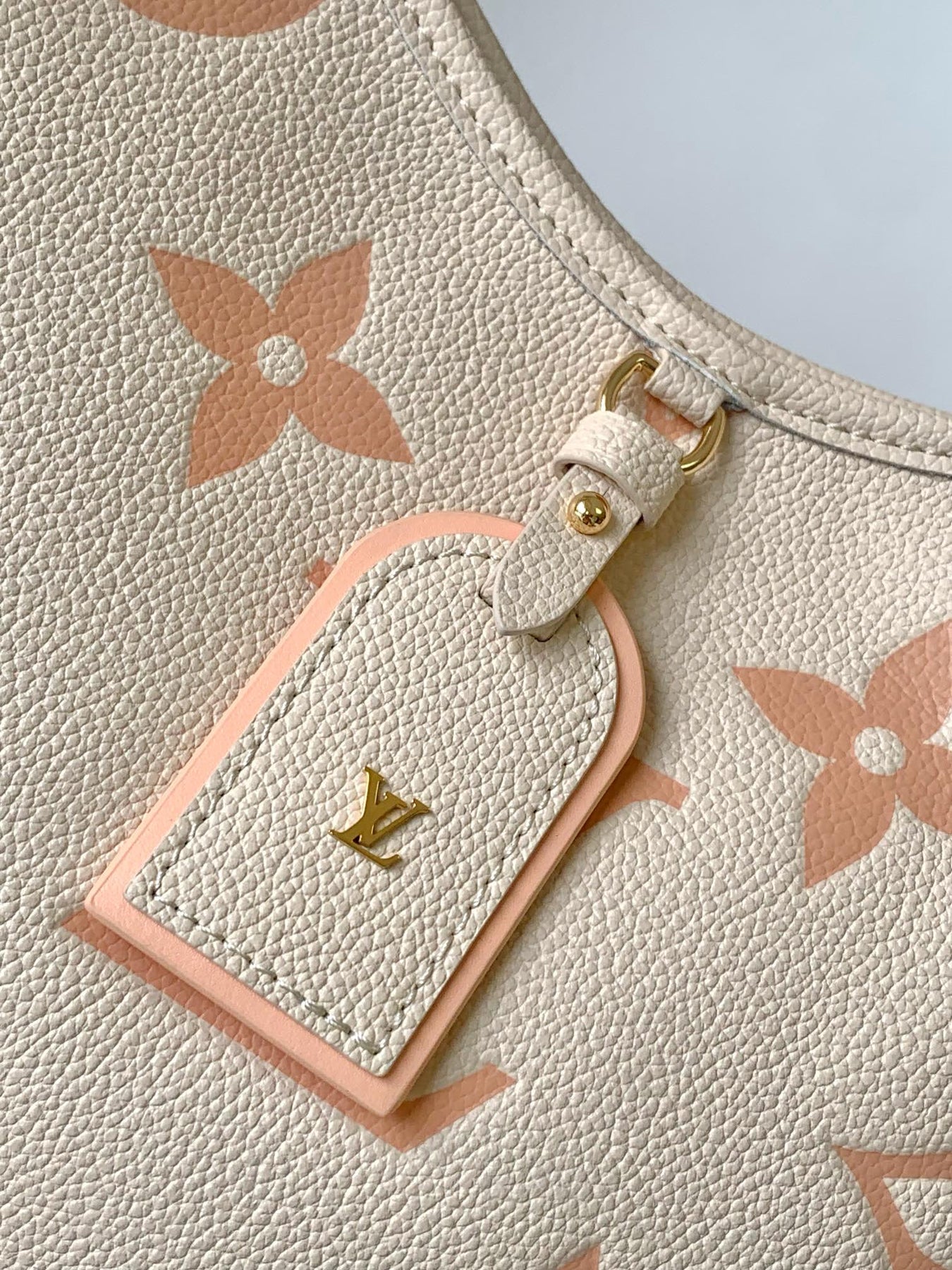 CARRYALL PM 29 BAG IN BEIGE MIX PINK MONOGRAM EMPREINTE LEATHER