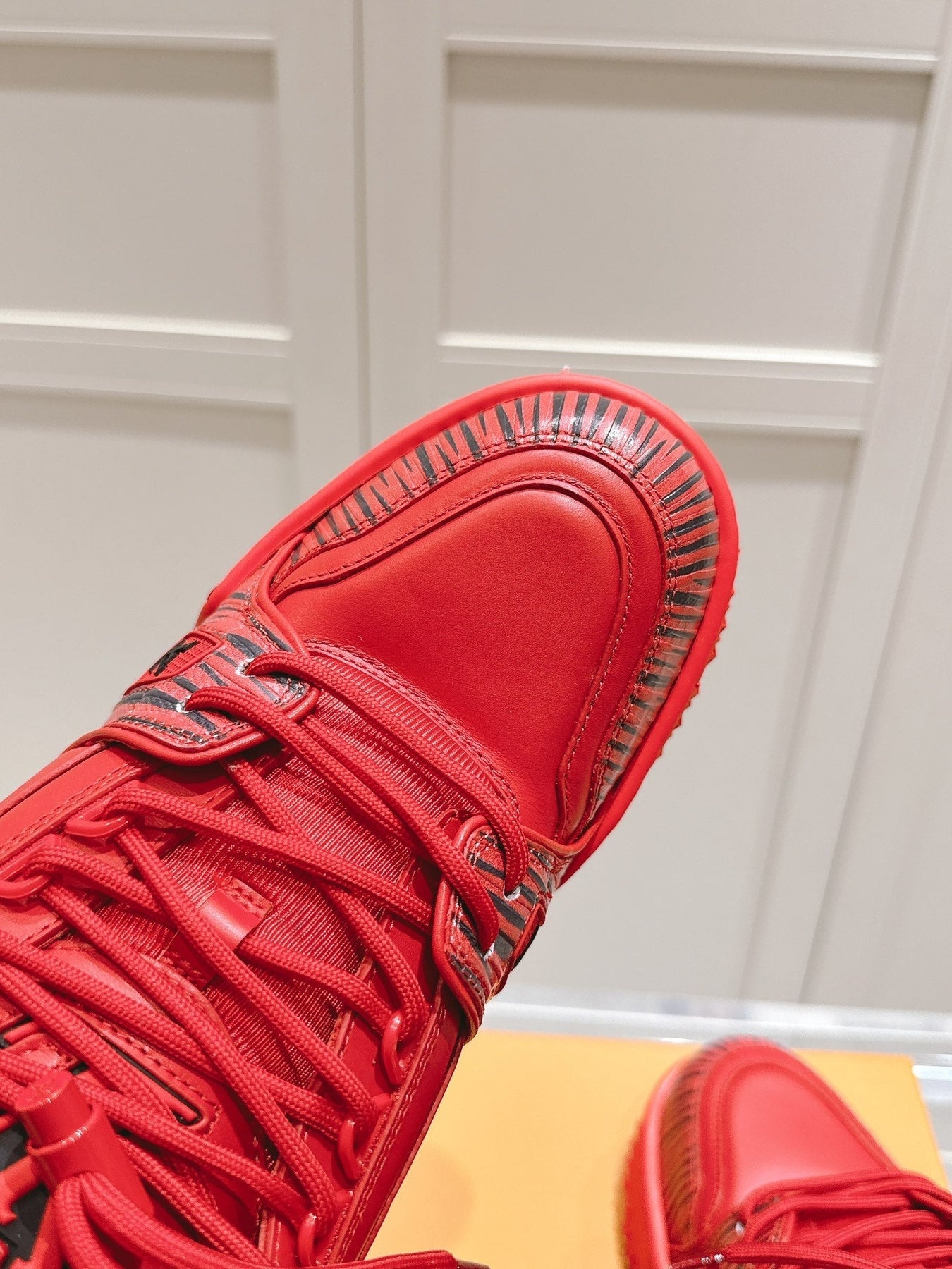 LV TRAINER MAXI LV X PARK SEO-BO IN RUBY RED CALFSKIN