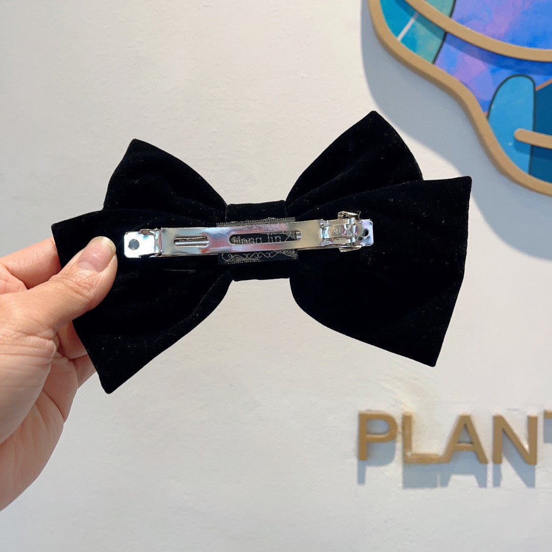 BLACK VELVET WITH GOLD LOGO HAIRPIN 387059