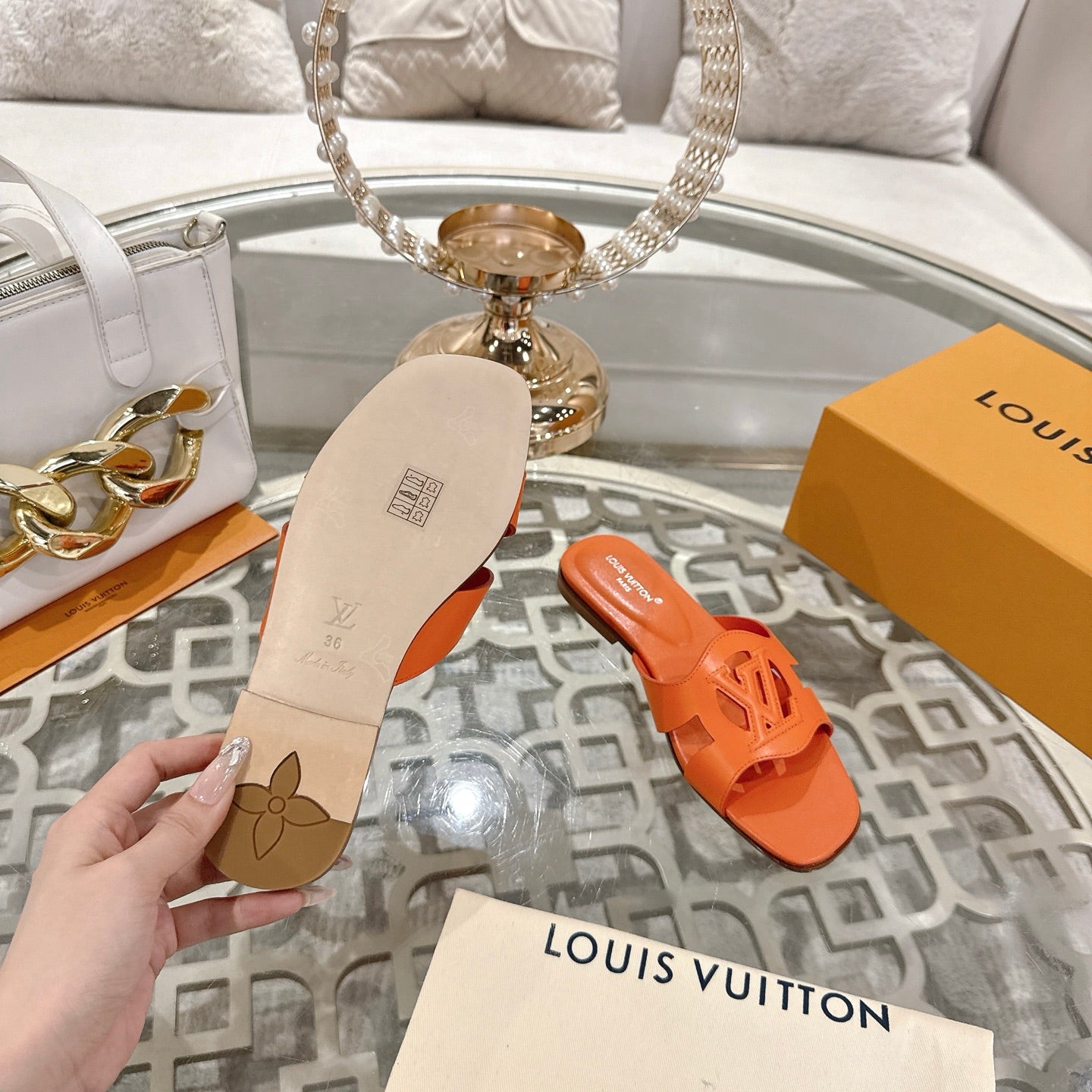 ISOLA FLAT SLIDE IN VIVID ORANGE CALFSKIN