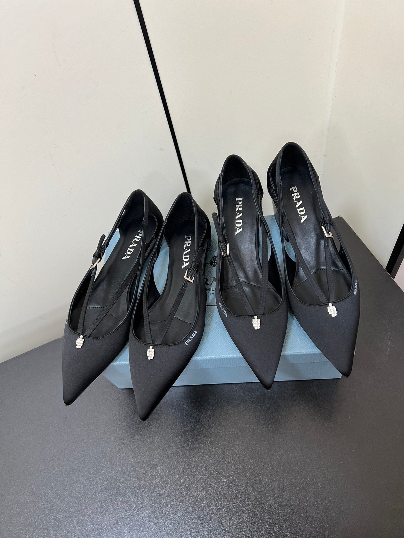 CUT-OUT PUMPS WITH BEAD BUCKLE IN BLACK SATIN