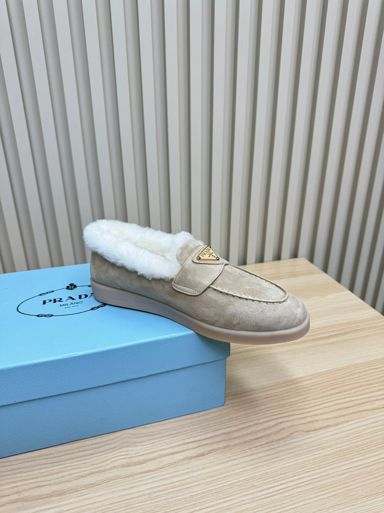 LOAFER IN KHAKI BEIGE SUEDE AND FUR LINING ATTACHED TRIANGLE LOGO
