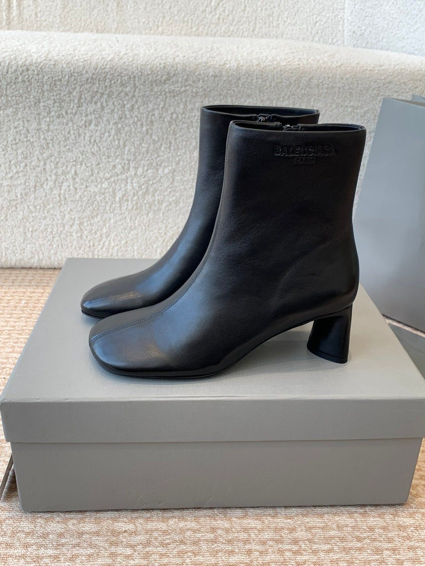 ANKLE BOOTS IN BLACK LOGO EMBOSSED SOFT SHEEPSKIN
