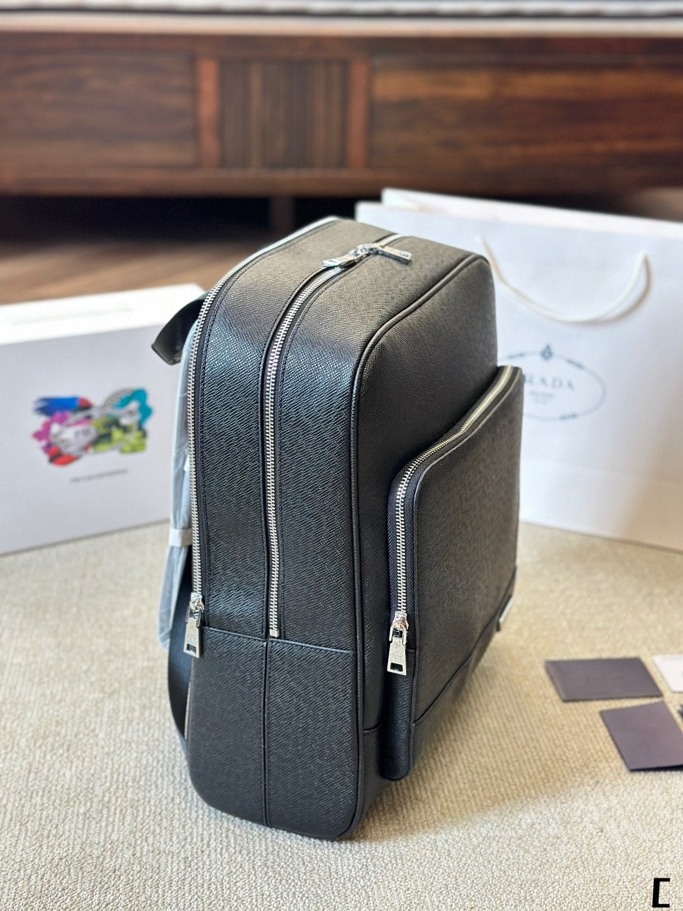 FRONT ZIP POCKET BACKPACK 38 IN BLACK GRAINED CALFSKIN