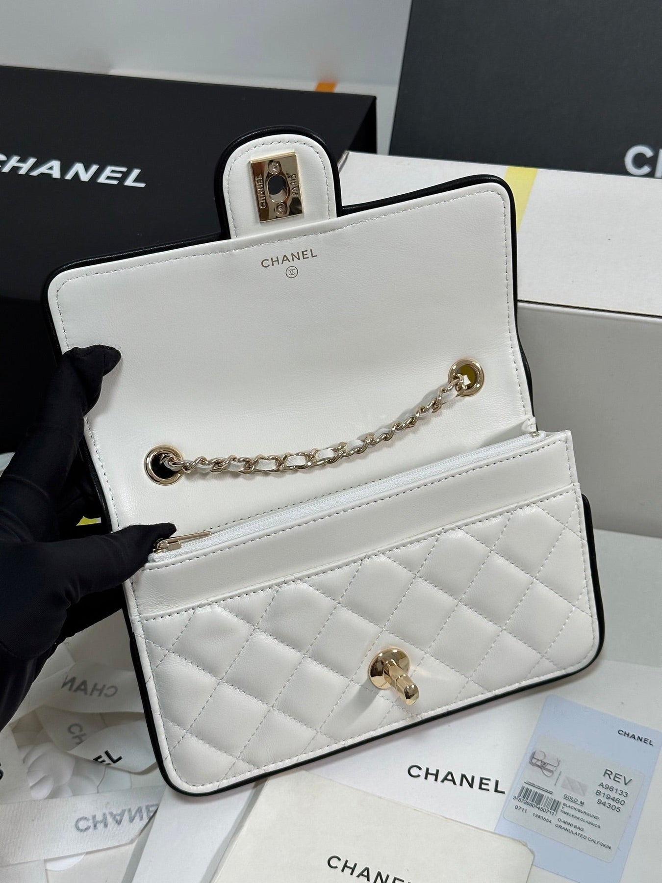 QUILTED FLAP BAG WITH BLACK TRIM 19 IN WHITE LAMBSKIN