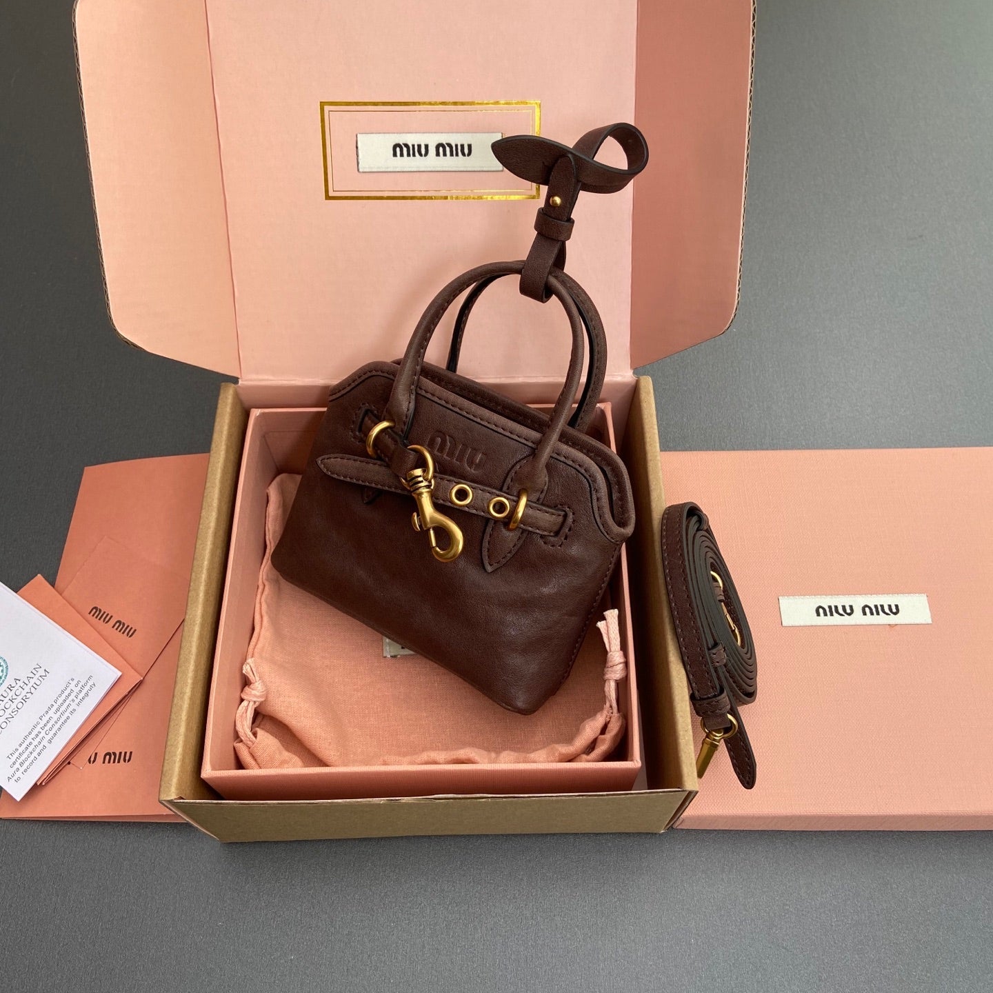 AVENTURE BAG 13 IN CRATER BROWN SHINY CALFSKIN