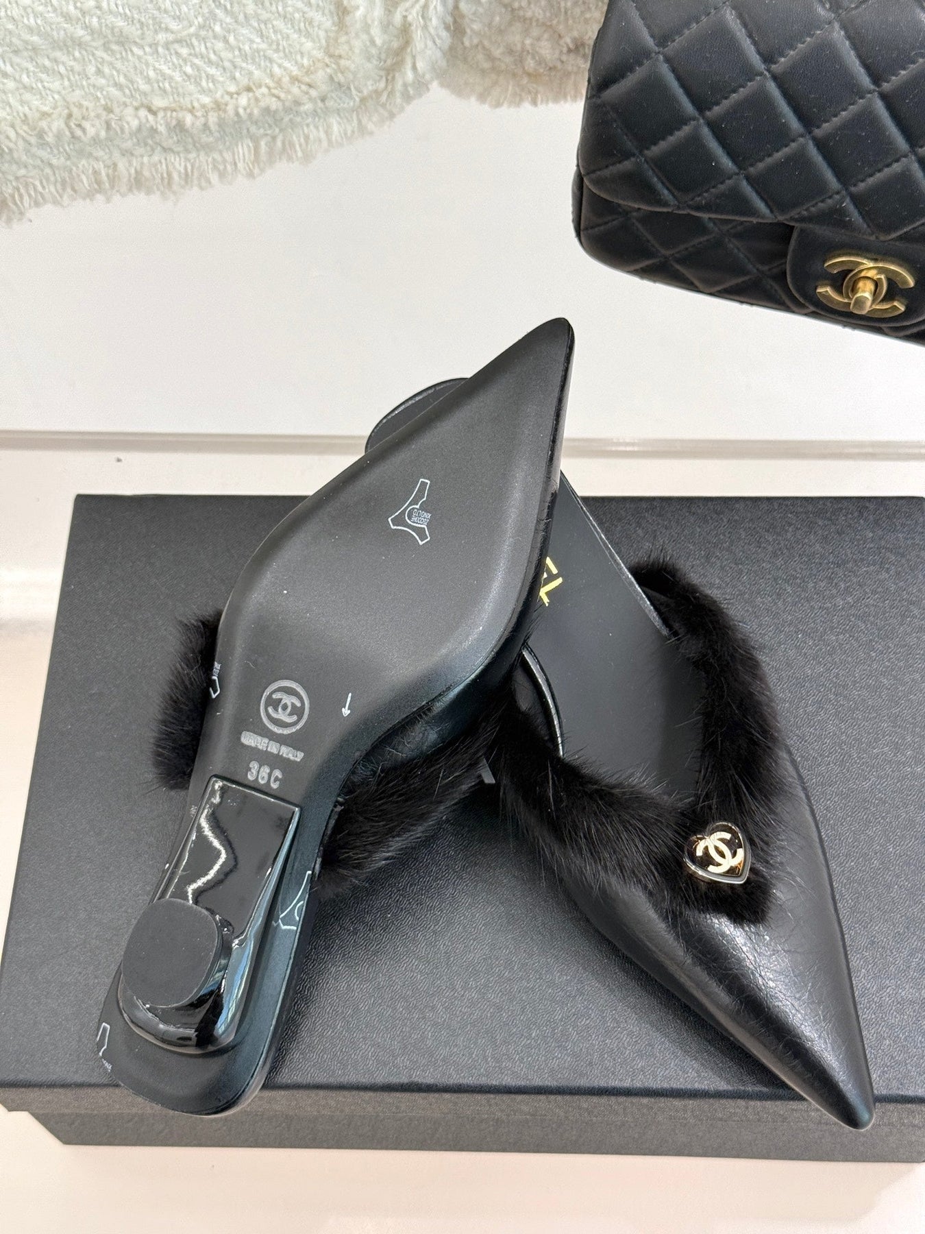 RABBIT FUR POINTED-TOE MULE IN BLACK LAMBSKIN