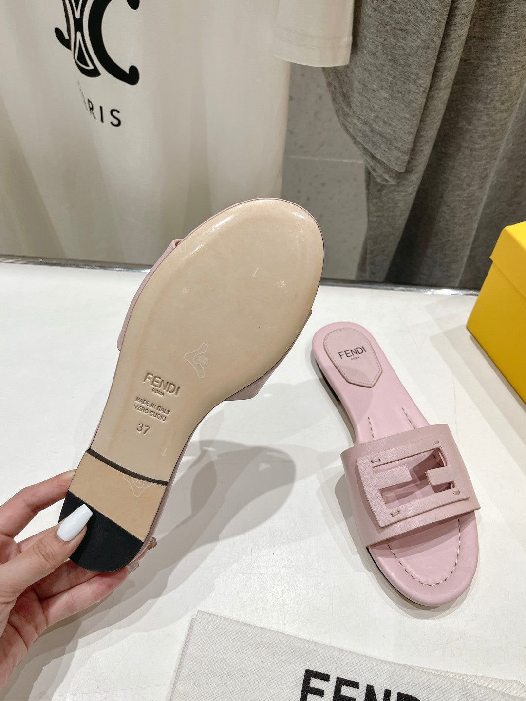 FENDI BAGUETTE SLIDES IN LIGHT PINK LAMBSKIN