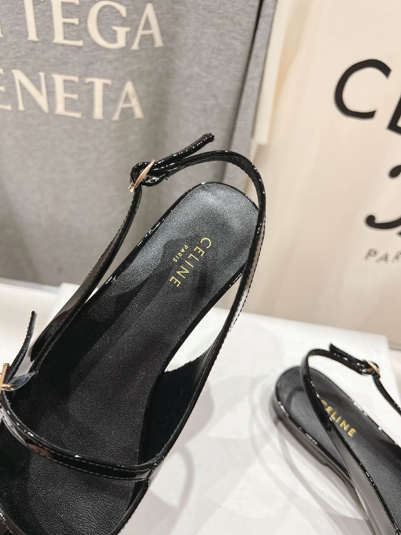 JUDY FLAT SLINGBACK IN BLACK PATENT CALFSKIN