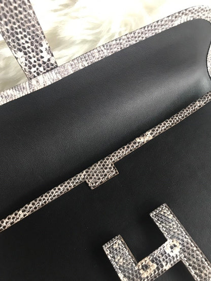 JIGE ELAN 29 CLUTCH IN BLACK CALFSKIN WITH WHITE LIZARD SKIN