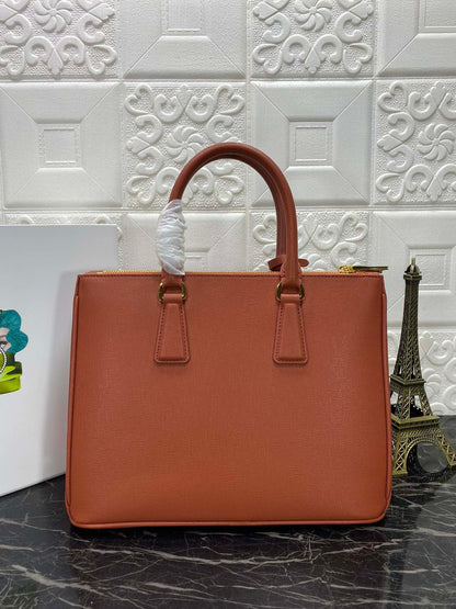 PRA GALLERIA 32 BAG IN BRONZE ORANGE SAFFIANO LEATHER