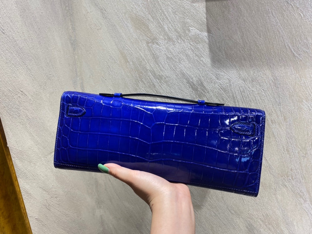 KELLY CUT 31 IN ADMIRAL BLUE SHINNY ALLIGATOR LEATHER WITH SILVER HARDWARE