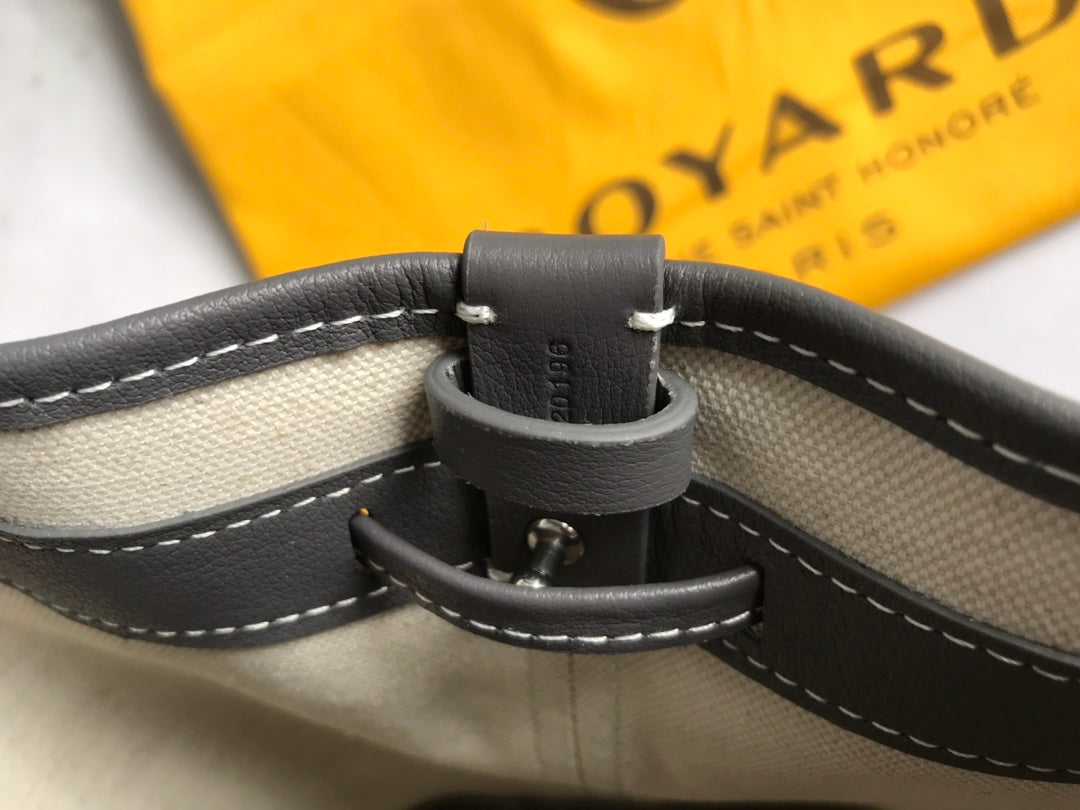 PETIT FLOT BUCKET BAG 22 IN GRAY GOYARDINE CANVAS AND LAMBSKIN TRIM