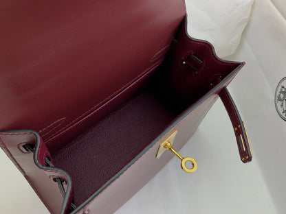 KELLY MINI 20 BAG IN WINE RED SMOOTH CALFSKIN WITH GOLD HARDWARE