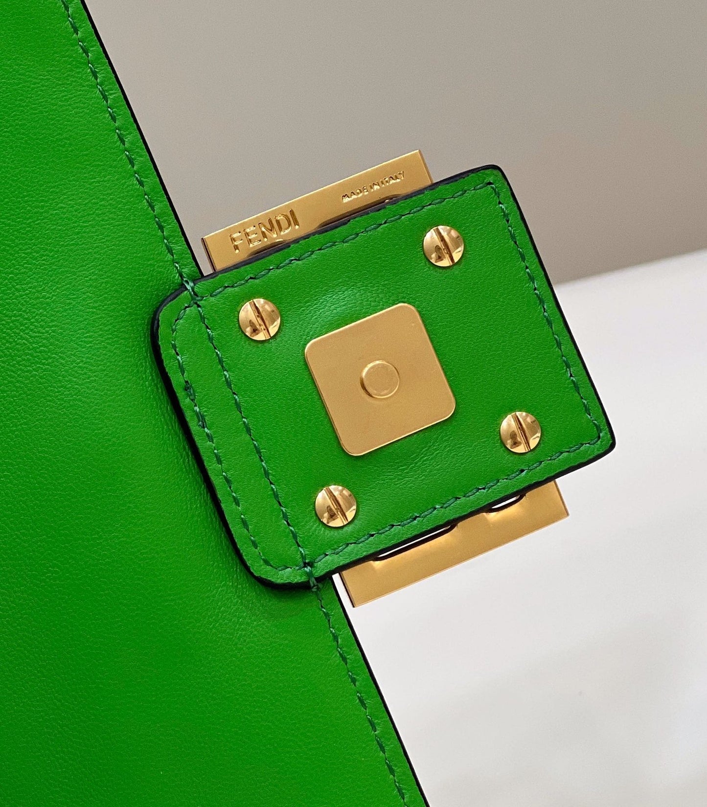 BAGUETTE WITH FF MOTIF 27 IN EMERALD GREEN SOFT LAMBSKIN GOLD HARDWARE