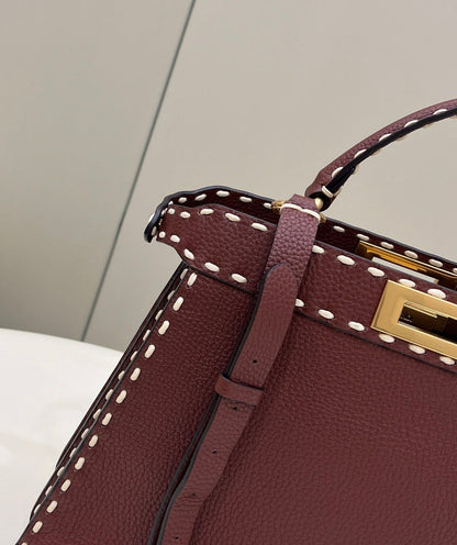 PEEKABOO ISEEU 33 IN SANGRIA RED GRAINED CALFSKIN GOLD HARDWARE