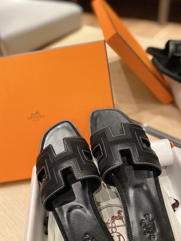 0RAN SANDALS IN BLACK CALFSKIN AND CANVAS