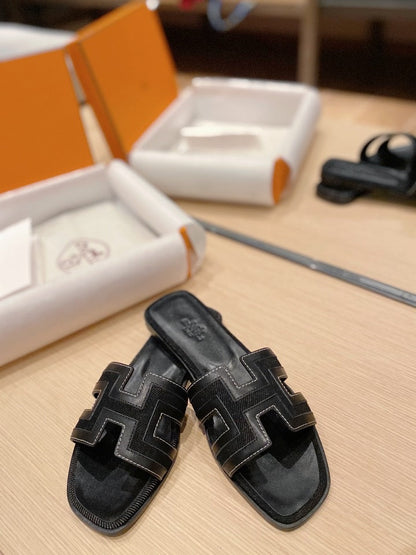 0RAN SANDALS IN BLACK CALFSKIN AND CANVAS