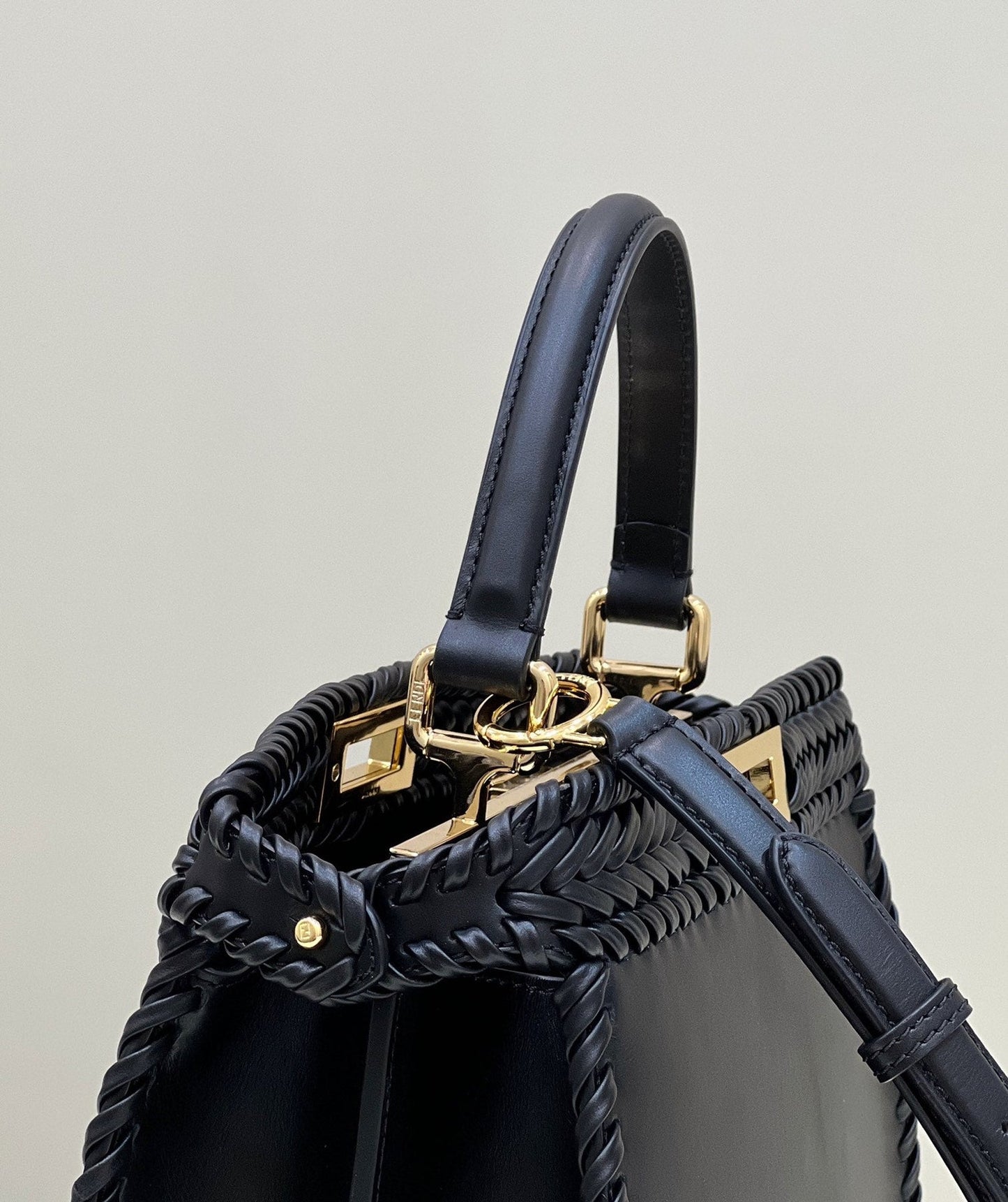 PEEKABOO ISEEU 27 IN BLACK SMOOTH CALFSKIN WITH WOVEN TRIM GOLD HARDWARE