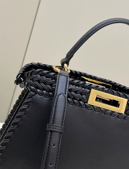 PEEKABOO ISEEU 27 IN BLACK SMOOTH CALFSKIN WITH WOVEN TRIM GOLD HARDWARE