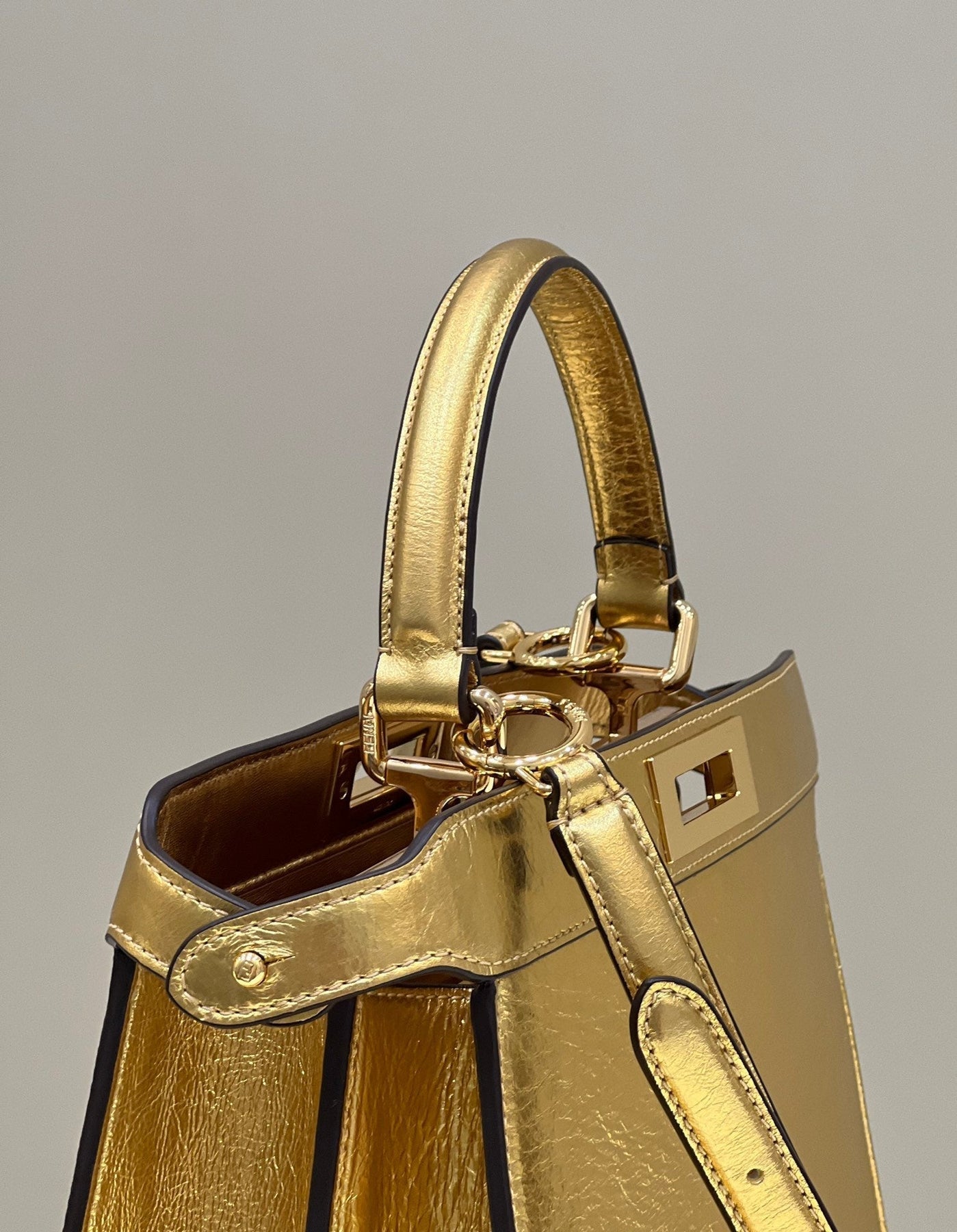 PEEKABOO ISEEU 33 IN GOLD METALLIC CALFSKIN GOLD HARDWARE