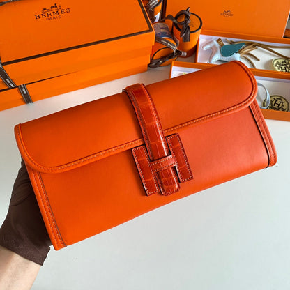 JIGE ELAN 29 CLUTCH IN BRIGHT ORANGE CALFSKIN WITH LIZARD SKIN