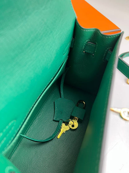 KELLY BAG 20 IN TEAL GREEN OSTRICH LEATHER WITH GOLD HARDWARE