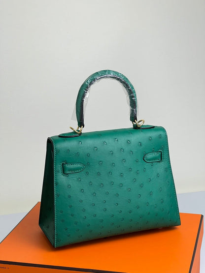 KELLY BAG 20 IN TEAL GREEN OSTRICH LEATHER WITH GOLD HARDWARE