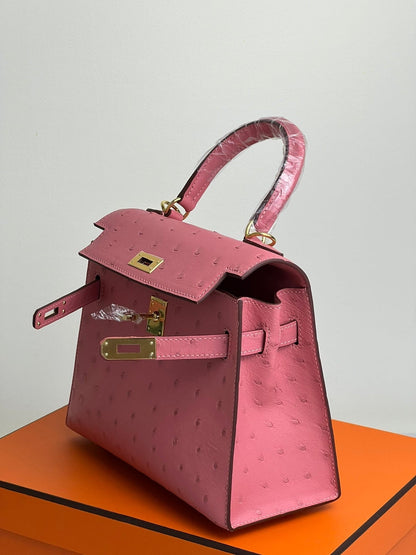 KELLY BAG 20 IN ROUGE PINK OSTRICH LEATHER WITH GOLD HARDWARE