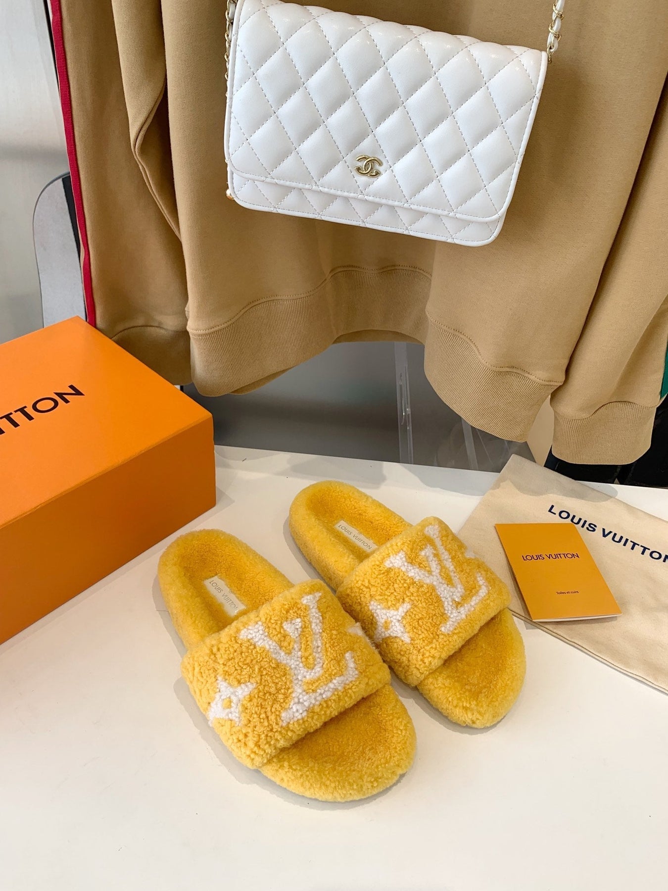 LV WOMEN'S PASEO FLAT SLIPPER IN YELLOW FLEECE WITH WHITE LOGO