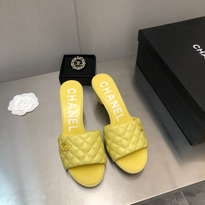 DIAMOND-QUILTED 6 CM SANDALS IN BRIGHT YELLOW LAMBSKIN