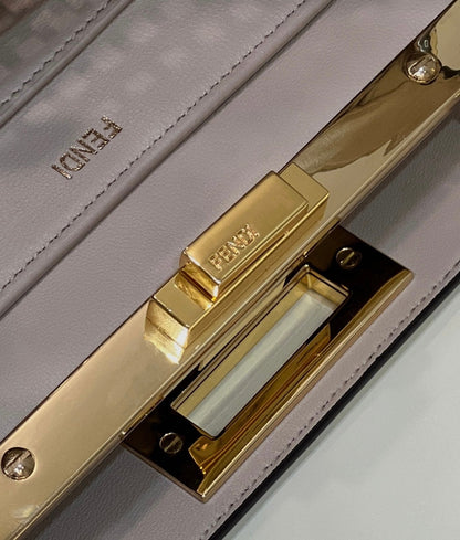 PEEKABOO ISEEU 34 IN WHITE PERFORATED CALFSKIN GOLD HARDWARE