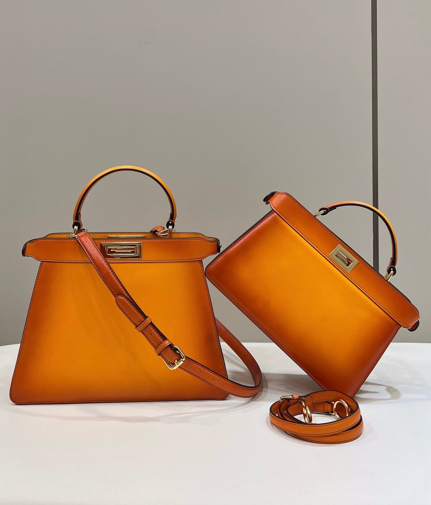 PEEKABOO ISEEU 33 IN ORANGE OMBRE SMOOTH CALFSKIN GOLD HARDWARE