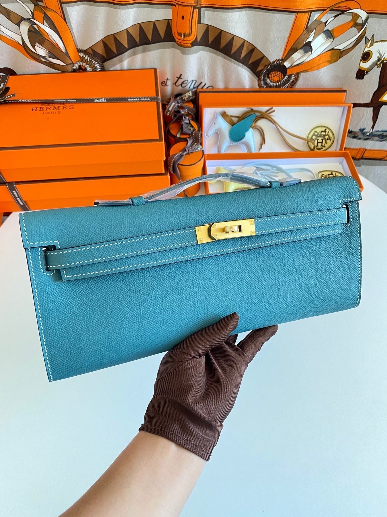 KELLY CUT 31 IN AZURE BLUE CALFSKIN WITH GOLD HARDWARE