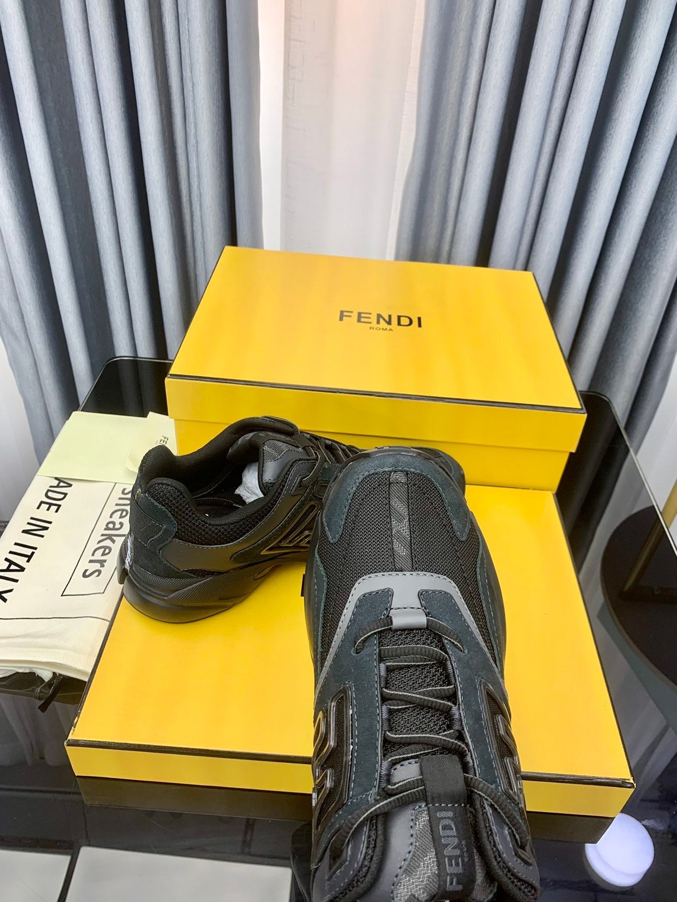 FENDI FASTER TRAINER IN BLACK CALFSKIN AND SUEDE