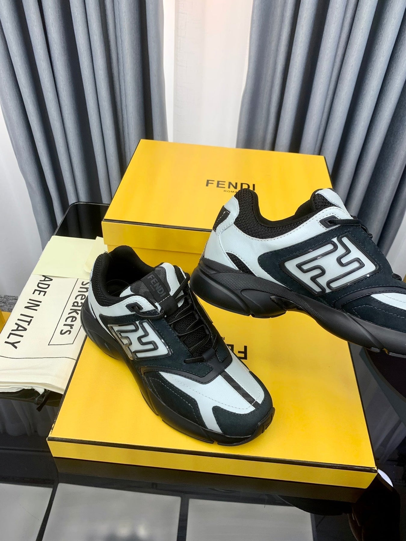 FENDI FASTER TRAINER IN BLACK SUEDE MIX WHITE CALFSKIN