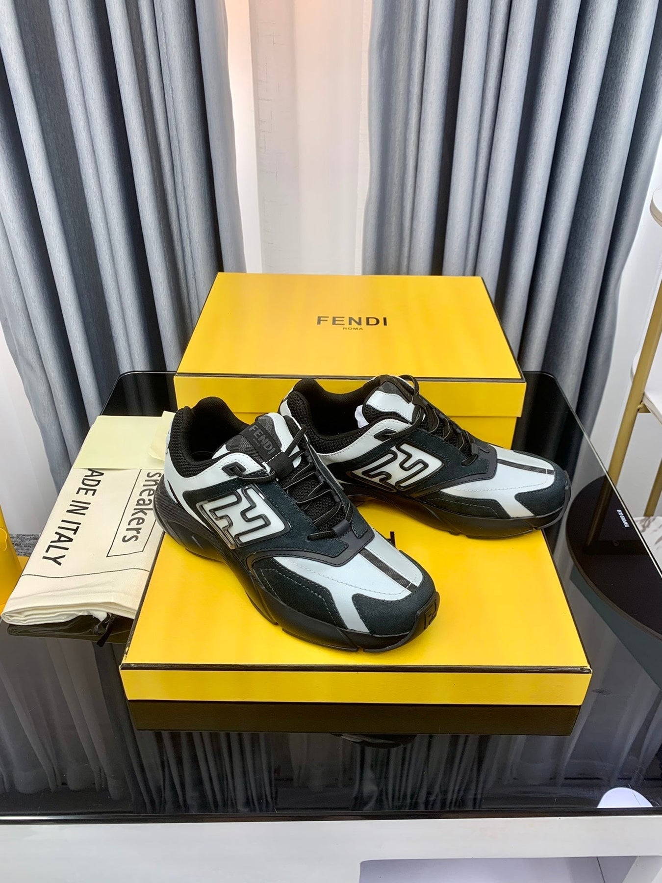 FENDI FASTER TRAINER IN BLACK SUEDE MIX WHITE CALFSKIN