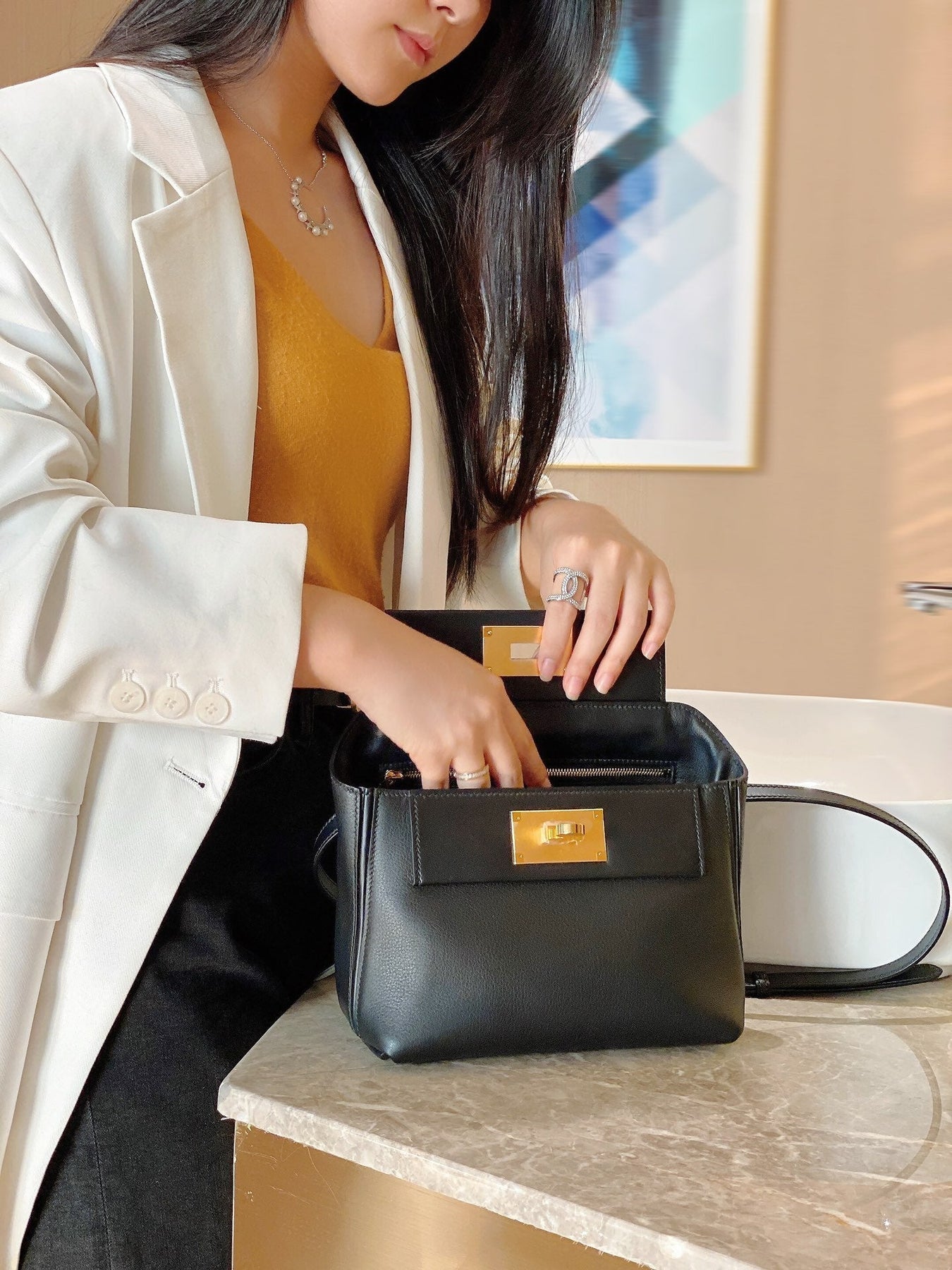 MINI 24/24 21CM IN BLACK EVERCOLOR CALFSKIN GOLD KELLY BUCKLE