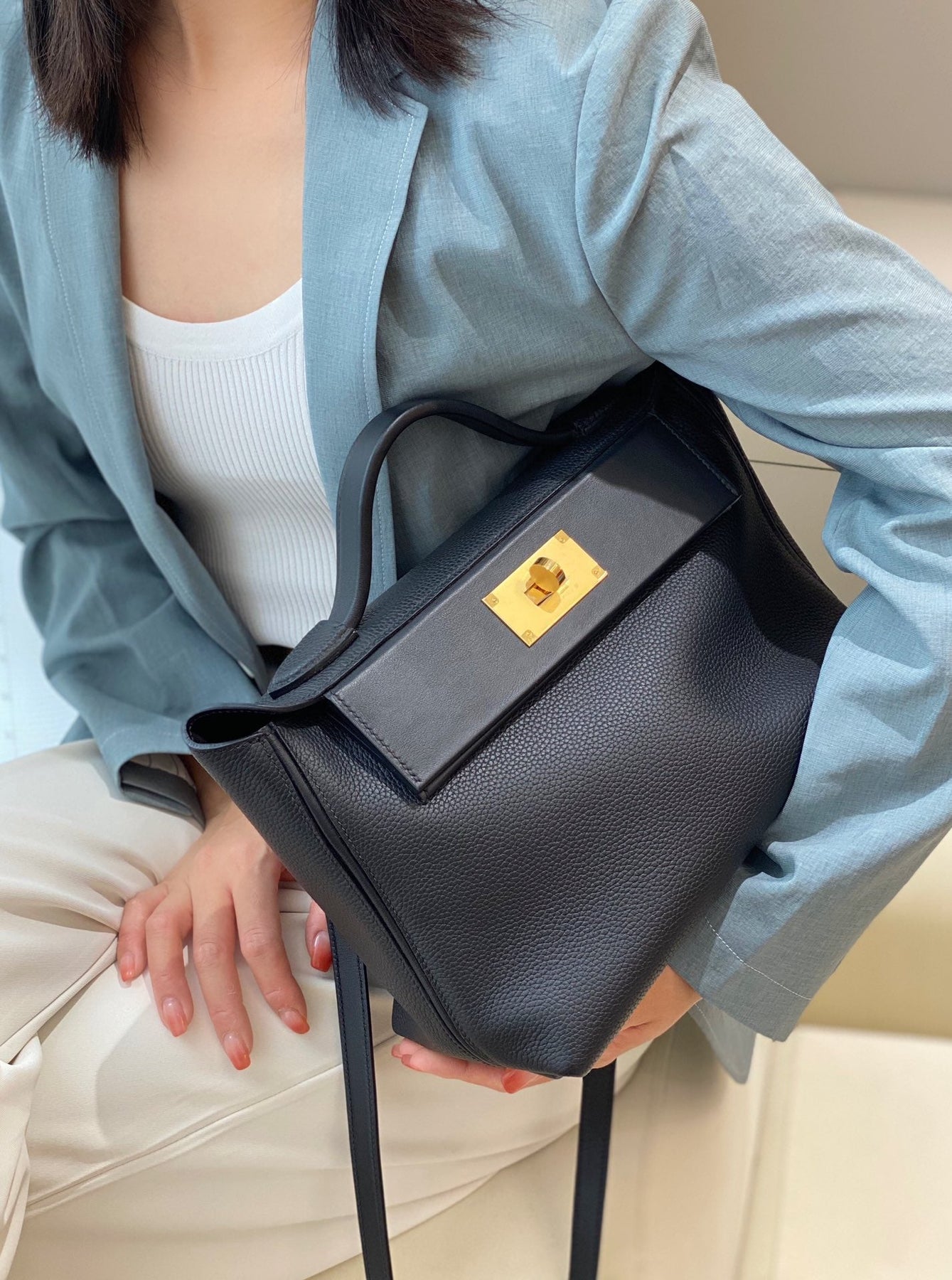 MINI 24/24 29CM IN BLACK EVERCOLOR CALFSKIN GOLD KELLY BUCKLE