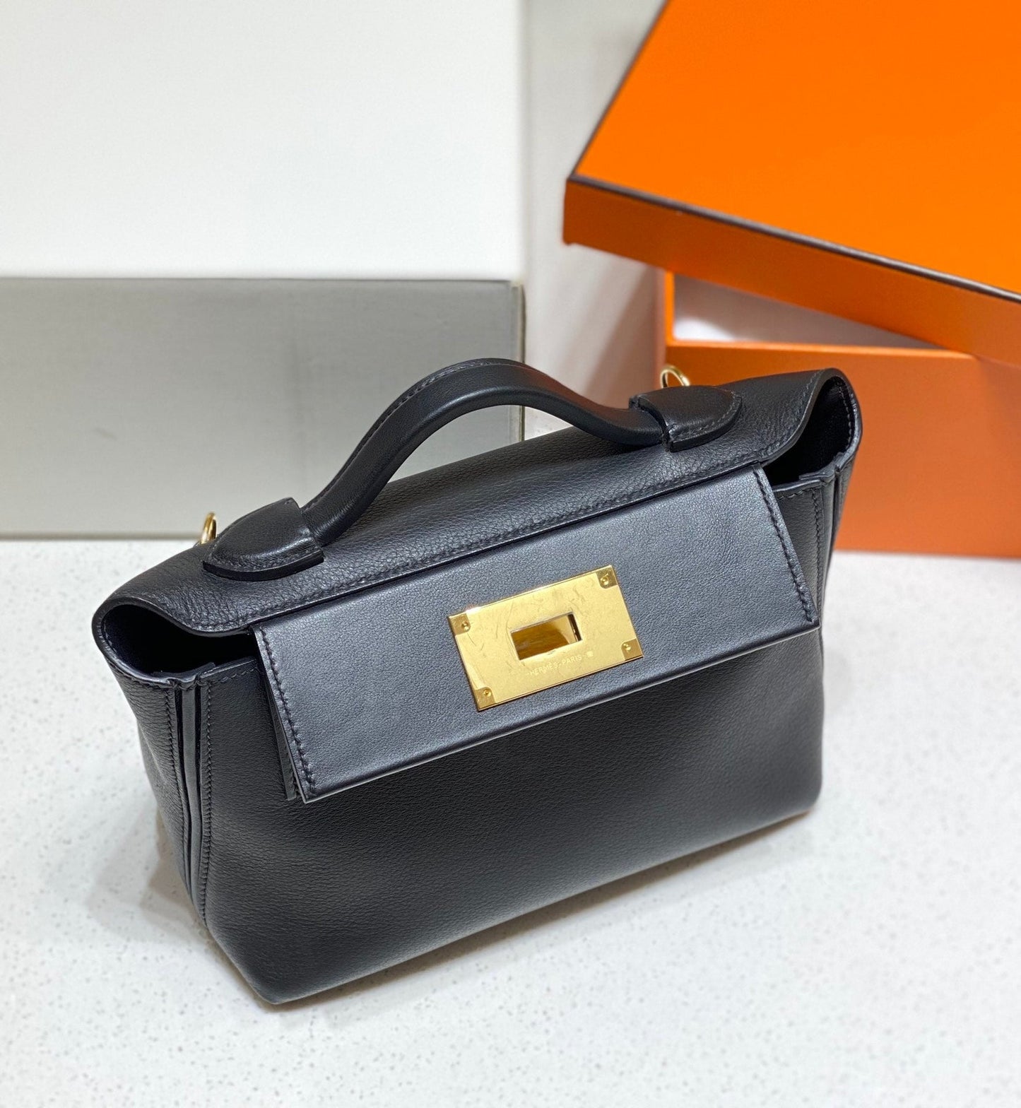 MINI 24/24 21CM IN BLACK EVERCOLOR CALFSKIN GOLD KELLY BUCKLE